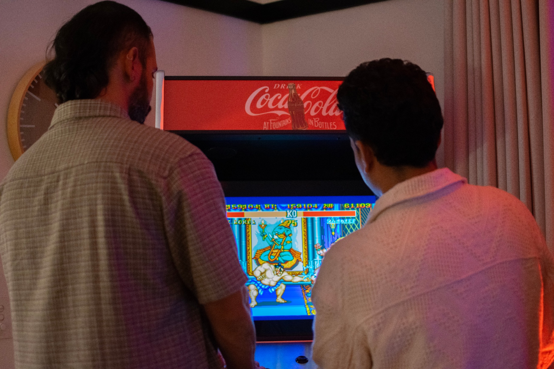 Friends at the Coca-Cola arcade machine