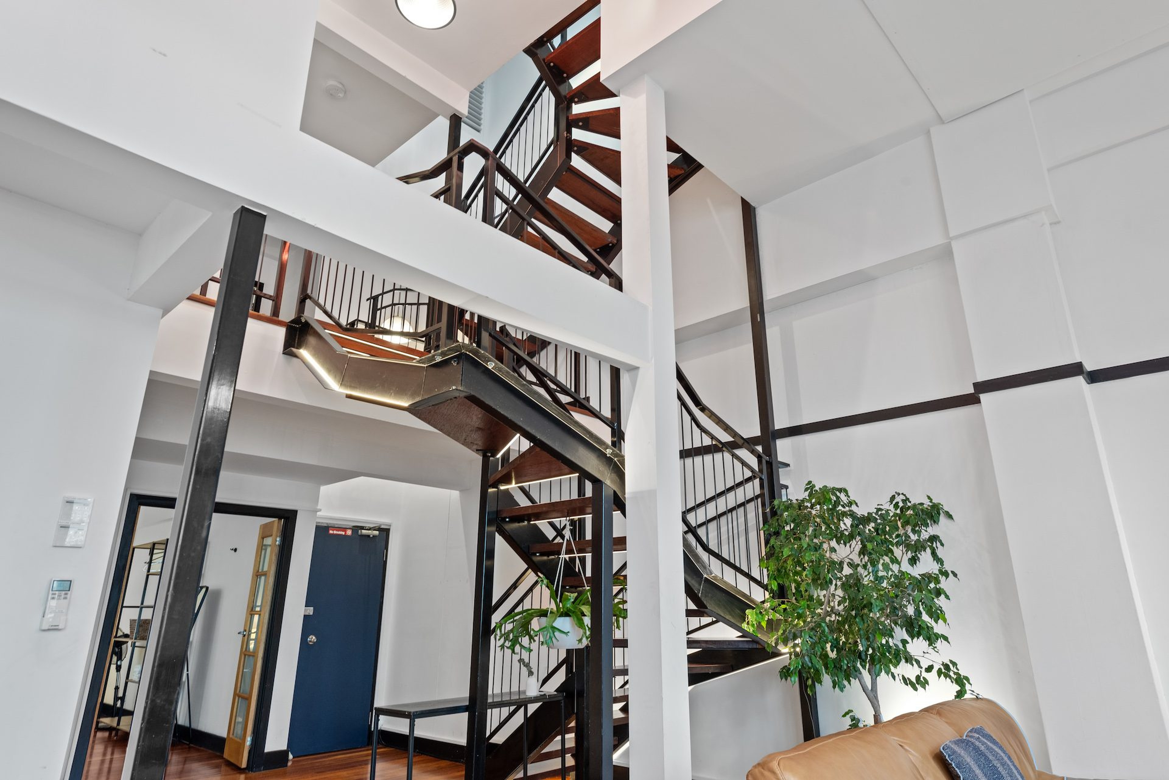 Brass staircase and plants